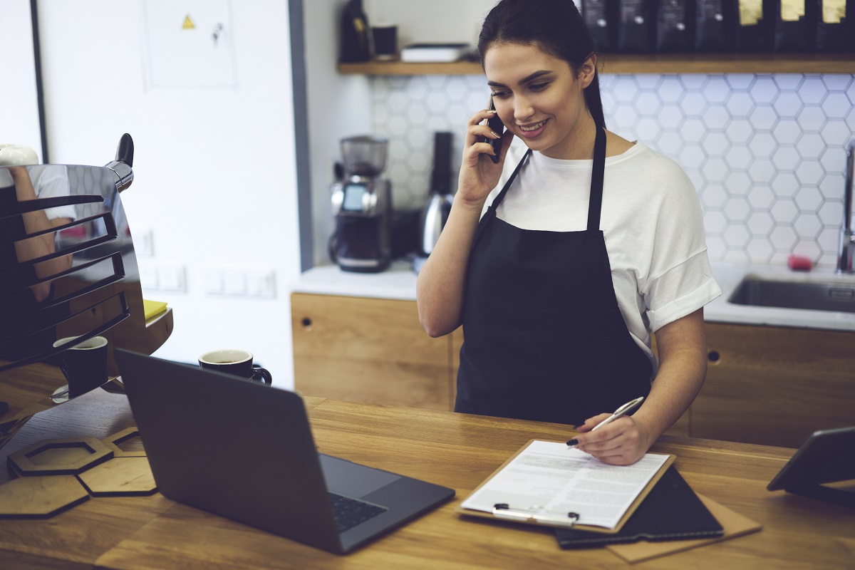 Cashier talking on the phone