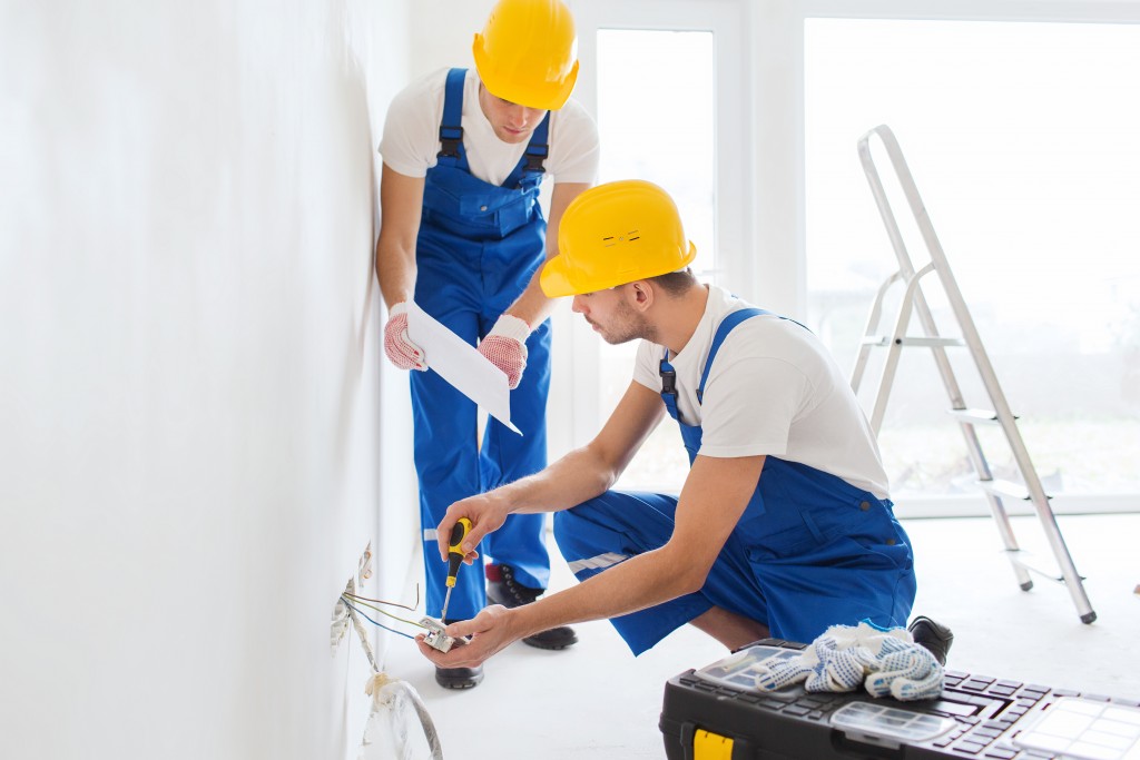 men renovating the house