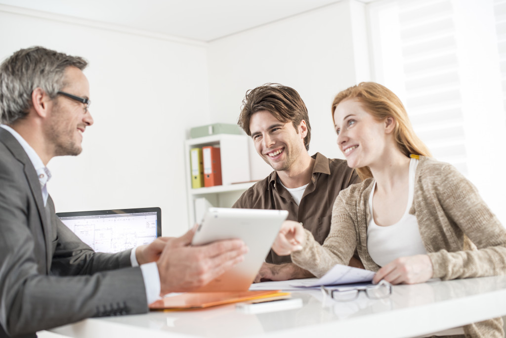 couple with real-estate agent