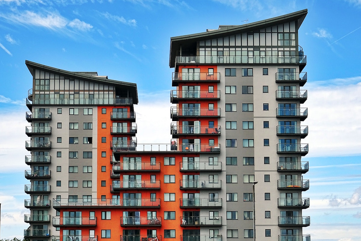 Gray, Red, and Orange Concrete Building